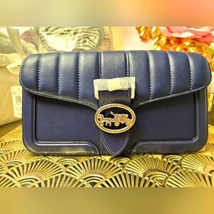 Coach Georgie shoulder